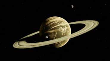 Saturno y su satélite natural