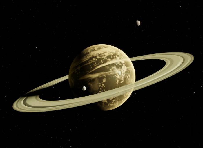 Saturno y su satélite natural